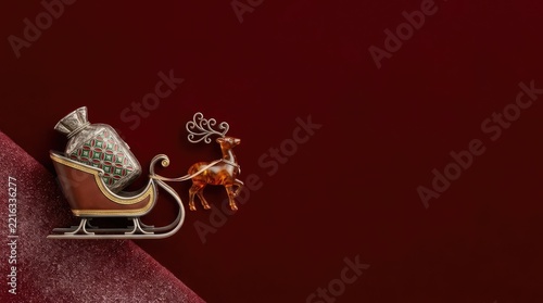 Elegant Christmas Decoration Featuring an Ornate Sleigh with a Gift Sack and a Reindeer Figurine on a Deep Red Background with Ample Negative Space for Festive Text or Holiday Messages