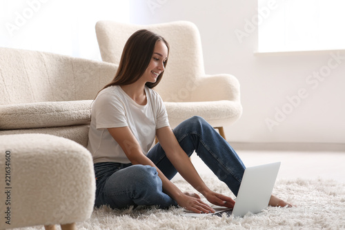 Remote work and digital nomad lifestyle, young woman using laptop for freelan...