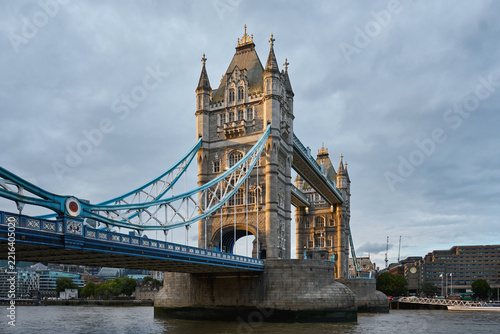 Photography Tower Bridge spanning the River Thames under dramatic clouds in London