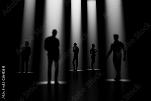 Selected individuals standing in separate spotlights within a dark group 3D