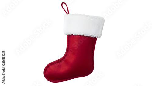 Red Christmas stocking with fluffy trim hanging against a bright isolated studio setting for holiday gifting concepts