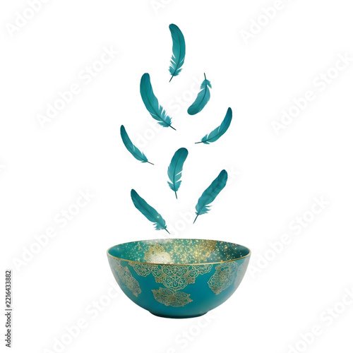 Teal feathers falling into an ornate golden bowl with a white void