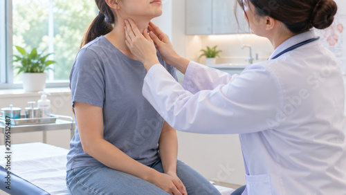 Cancer screening young adults neck examination doctor clinic patient medical checkup