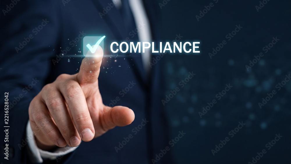 Obraz premium Businessman interacting with digital policy compliance and security text interface, hand close up concept
