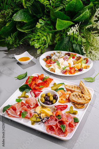 Charcuterie platter with antipasto and cheese selection