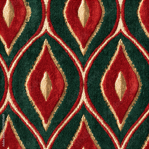 Seamless pattern velvet fabric with traditional red and green colors and gold embroidery forming an elegant ogee pattern, creating a rich textile background