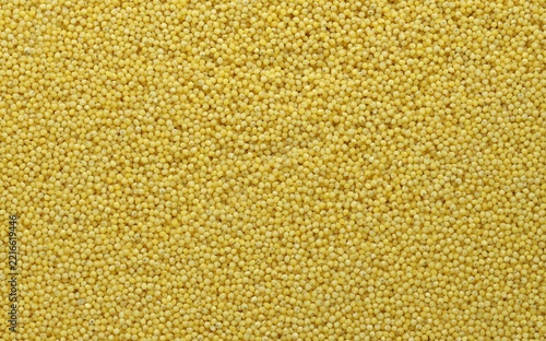 Top View Of Raw Dried Yellow Millet Grains Texture Background