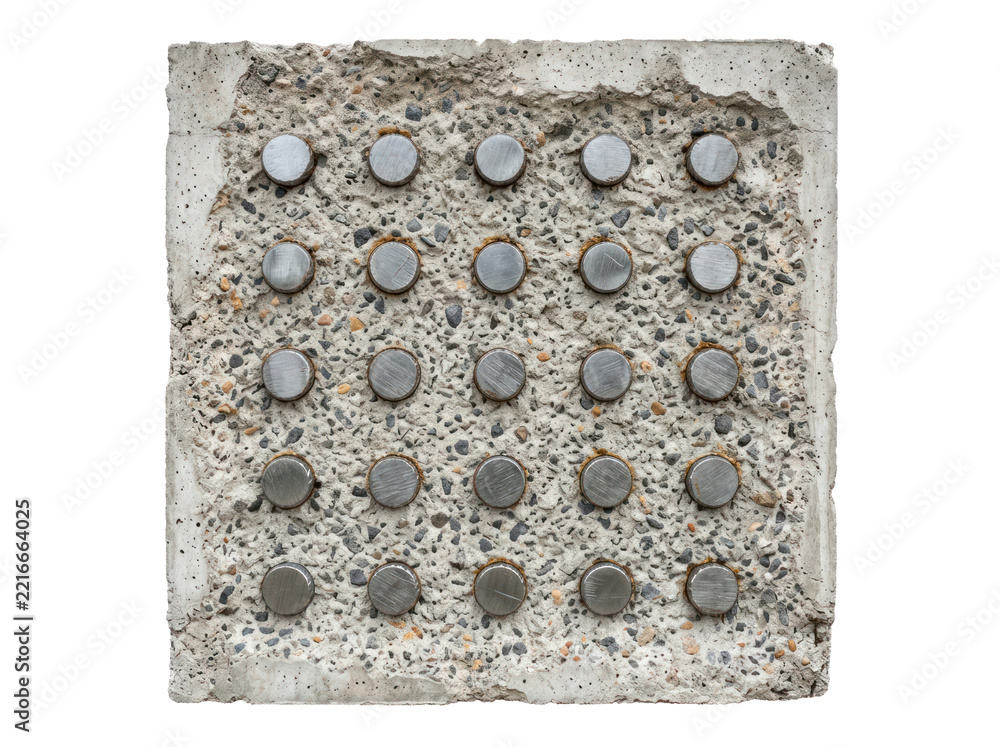 Fototapeta premium Tactile Concrete Paving Slab with Metal Studs Isolated on Black Background