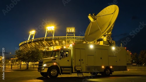 Truck equipped with a media antenna for an event.