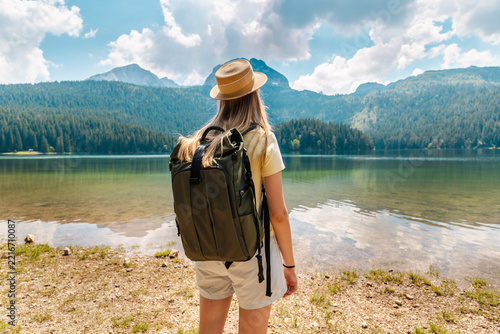 Hiker with Backpack at Black Lake in Durmitor Montenegro