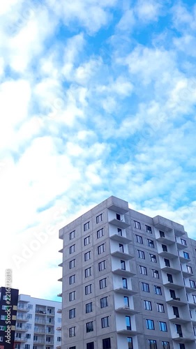 Construction of an apartment building using precast concrete slabs and reinforced concrete structures vertical. Construction site of an apartment building. Housing construction