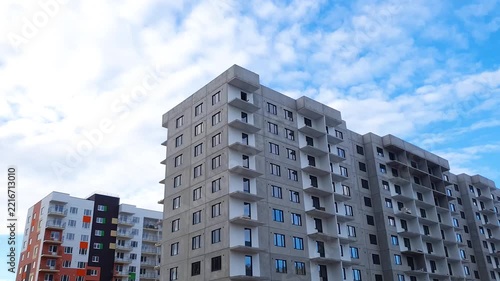 Construction of an apartment building using precast concrete slabs and reinforced concrete structures. Construction site of an apartment building. Housing construction