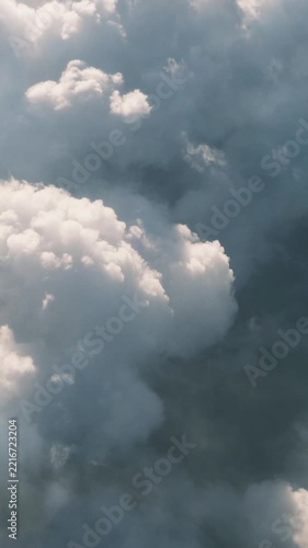 Towering White Cumulus Clouds Rising Through a Blue Sky