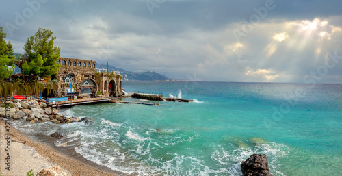 Seascape with building of recreation centre on Mediterranean seaside in Santa Margherita. Liguria, Italy