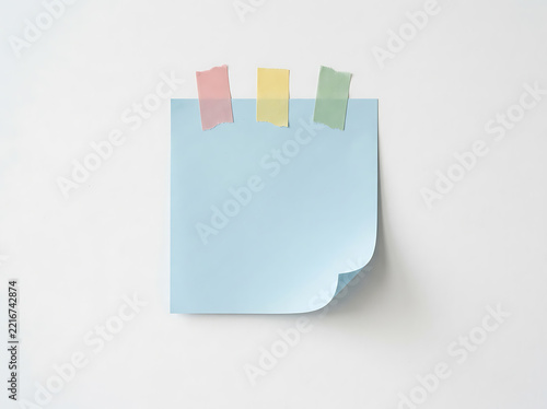 Blue sticky note with colorful tape strips