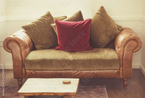 Leather Chesterfield Sofa With Colourful Cushions