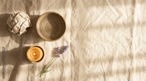 Ceramic Bowl Candle and Dried Herbs Flat Lay on Linen with Shadows