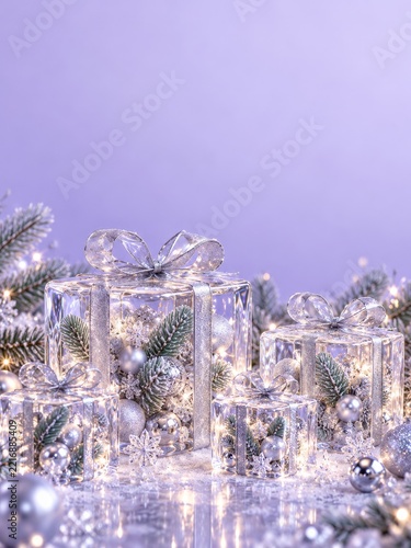 Transparent glass gift boxes with silver ribbons on a lavender icy floor