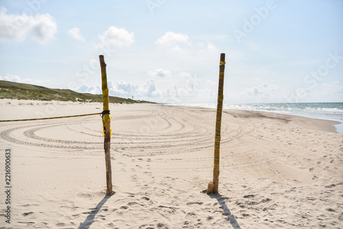 Tire Tracks in the Sand of the Borderland Between EU Member State Lithuania and the Russian Enclave of Kaliningrad by the Baltic Sea