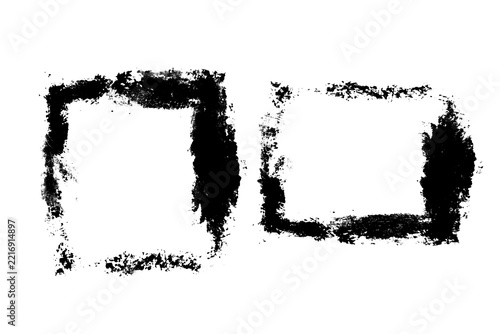Two grunge ink frames and distressed borders with rough black brush strokes on a white background for design elements