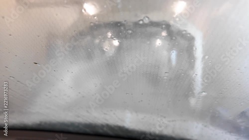 Vehicle Passing Through Automated Car Wash System