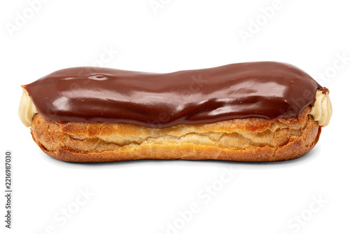 Delicious chocolate eclair pastry with cream filling isolated on a