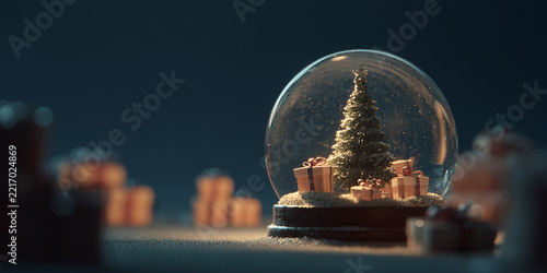 A snow globe featuring a miniature Christmas tree surrounded by gift boxes, evoking a sense of festive wonder and holiday cheer