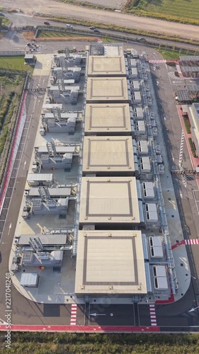 Aerial view of a large data center campus in Milan, highlighting the scale of technical infrastructure supporting reliable computing, business continuity and mission-critical digital operations.
