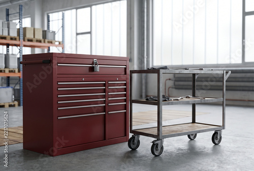 Lockable tool chest beside a maintenance cart