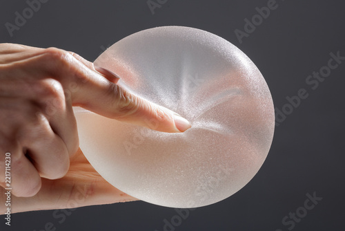 Breast Implants Demonstrating Elasticity During Plastic Surgery Consultation