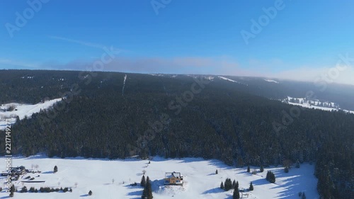 Mountains in winter captured from above in a continuous view