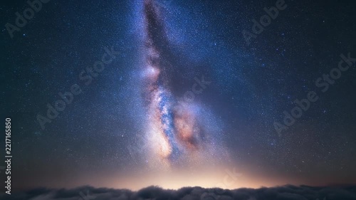 Majestic milky way fog over dark night clouds in space