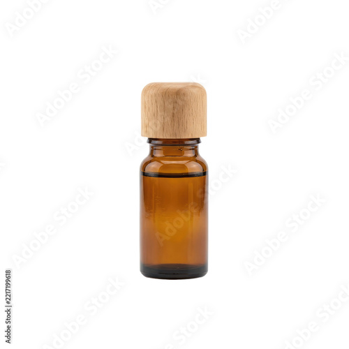 Amber glass essential oil bottle with wooden cap isolated on transparent background