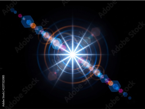 Bright blue starburst lens flare effect with circular light rings on