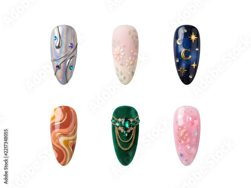 Set of six almond shaped false nails with diverse decorative including celestial and floral patterns isolated on a transparent background