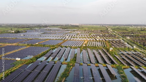 aerial view of photovoltaic power station on water and land