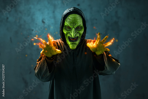 Scary witch with magic spell, Halloween theme