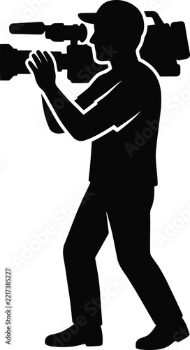 Professional Video Camera Operator Silhouette with Shoulder Mounted Broadcast Camcorder