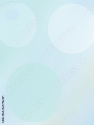 Light blue bokeh blur background with floating circular shapes and soft grain for subtle visual design.