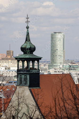 Copper tower of St Nicholas Orthodox Church and modern skyscraper of National Bank of Slovakia, Bratislava, Slovakia