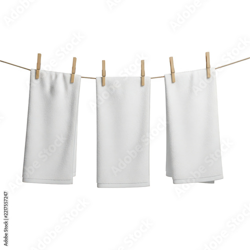 Three white clean towels hanging on clothesline with wooden clothespins, isolated on transparent background for laundry.