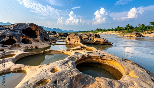 The spectacular Sam Phan Bok geological formation, known as the Grand Canyon of Thailand, showcases a vast array of natural rock sculptures carved by the Mekong River over millennia.