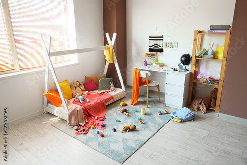 Childhood development and home schooling, cozy bedroom interior with teepee b...