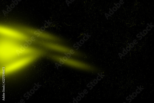 Abstract yellow light rays on a dark textured background, glowing beams of light emerging from the left side, artistic digital illustration with a vintage film grain effect