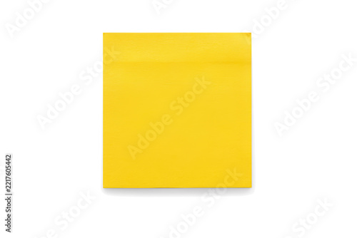 A single bright yellow square sticky note paper sheet for reminders and office organization, positioned centrally in a clean composition