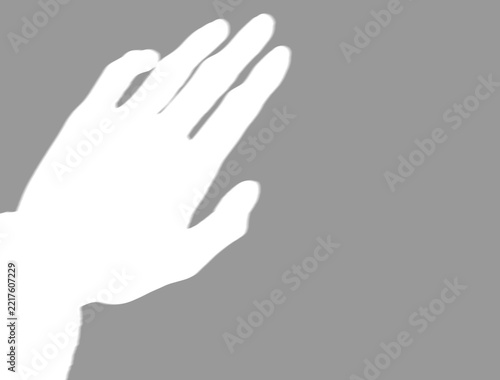 Soft shadow vignette of open human hand with transparent center cutout 