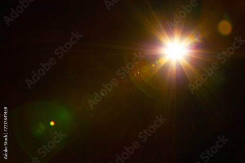 Sun flare on the black background