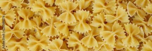 Top View Of Raw Uncooked Farfalle Bow Tie Pasta Texture Background