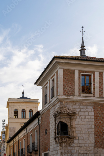 Ornate stone window bay on historic building facade