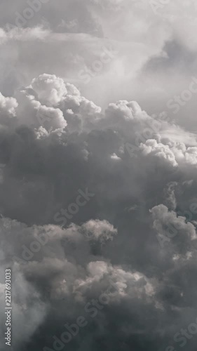 Dramatic Dark Clouds with Soft Sunlight Breaking Through and storms